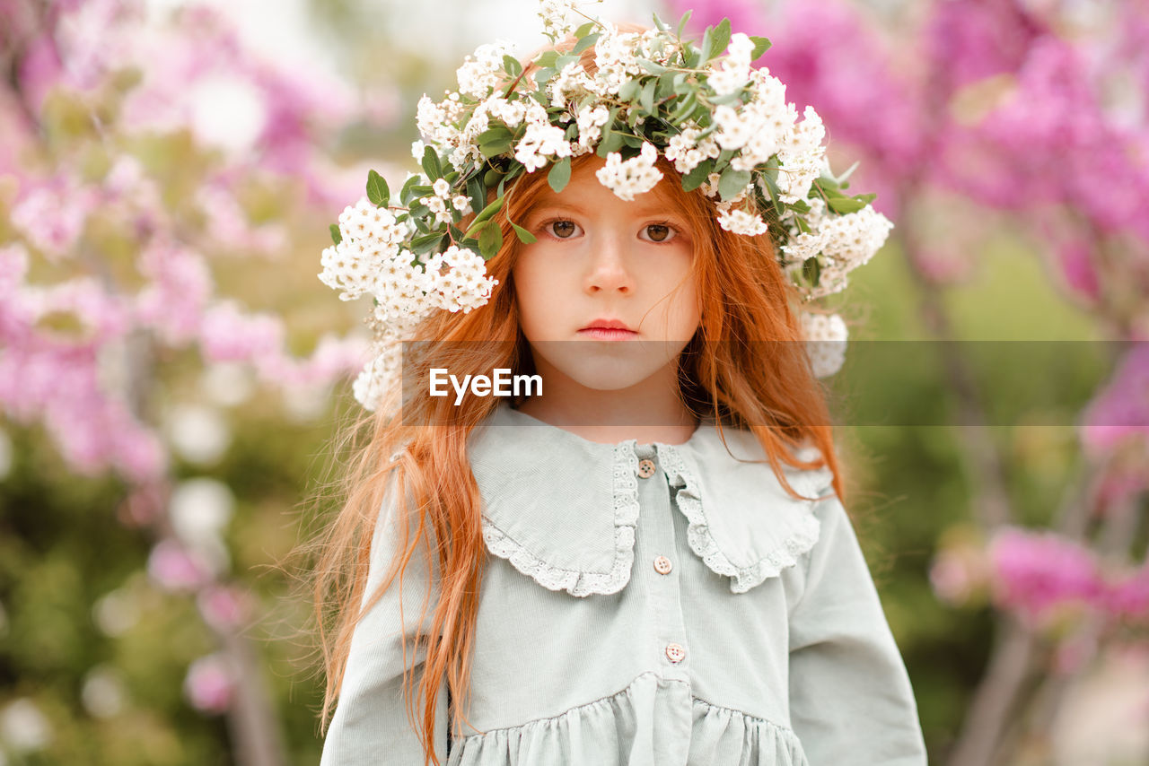 Portrait of girl wearing wreath