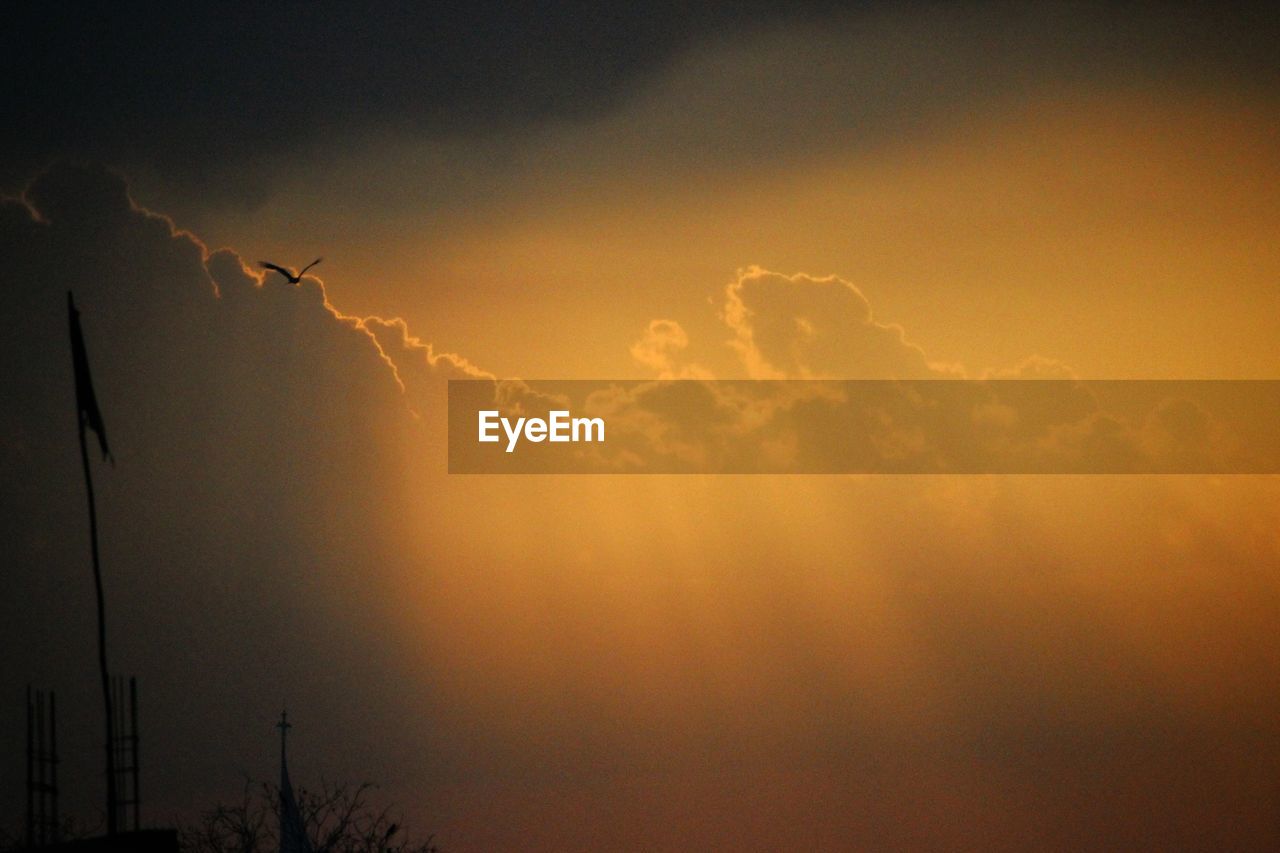 High section of dramatic sky at sunset