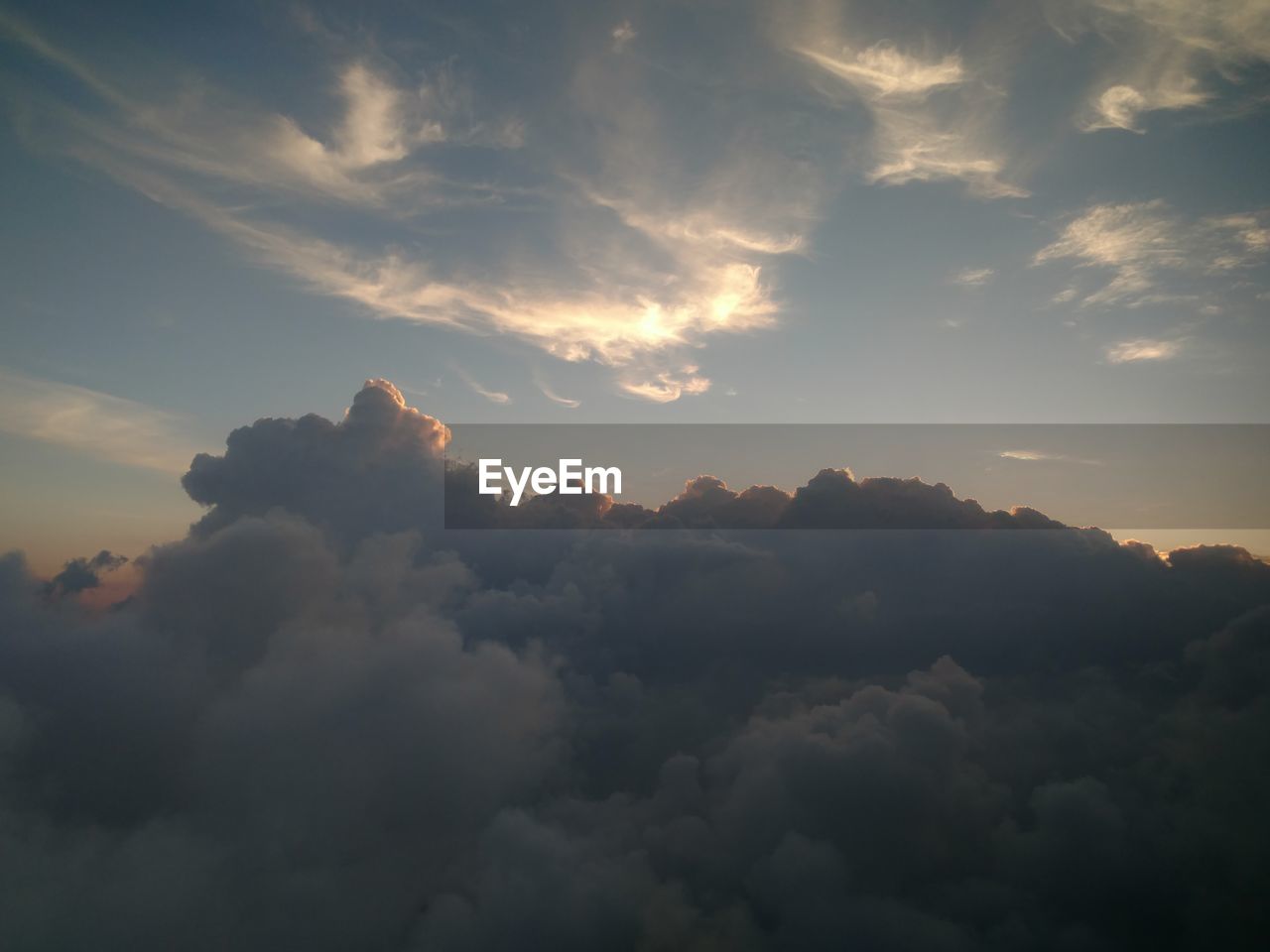 SCENIC VIEW OF MOUNTAINS AGAINST SKY AT SUNSET