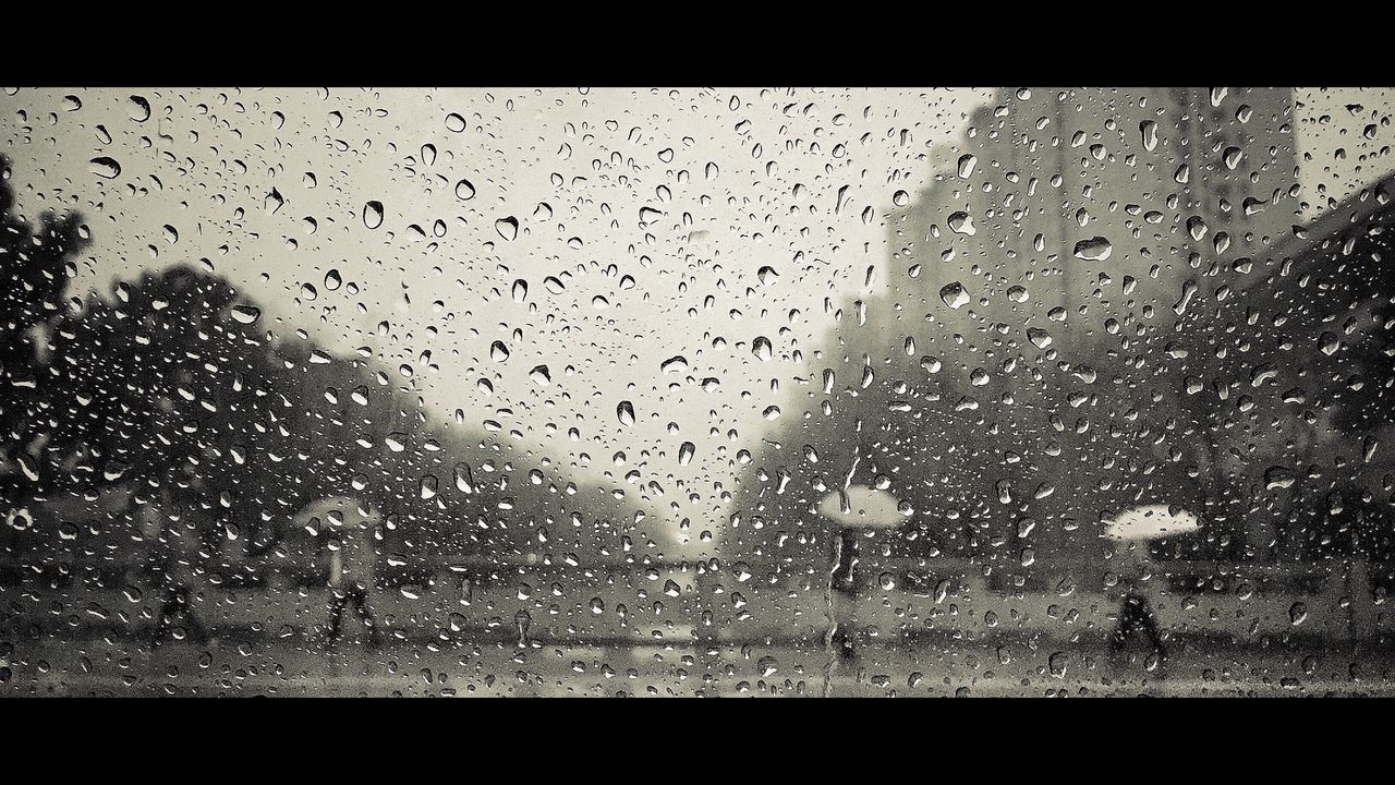 VIEW OF WATER DROPS ON GLASS