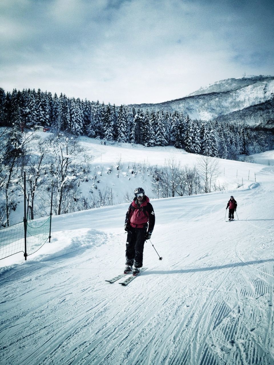 Men skiing in mountains