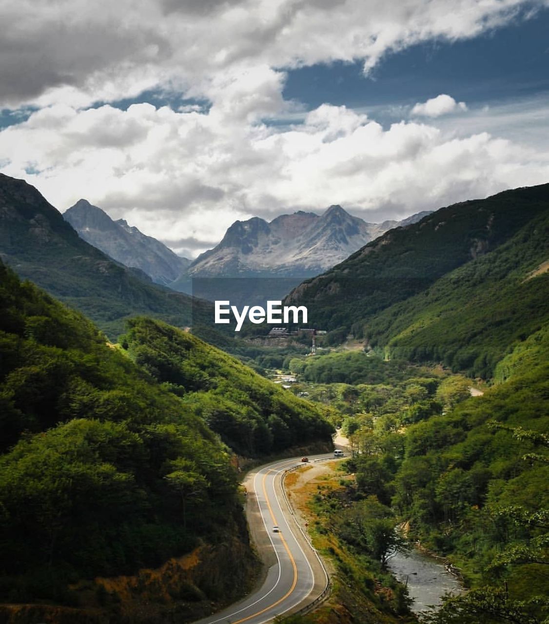 Scenic view of landscape and mountains against sky