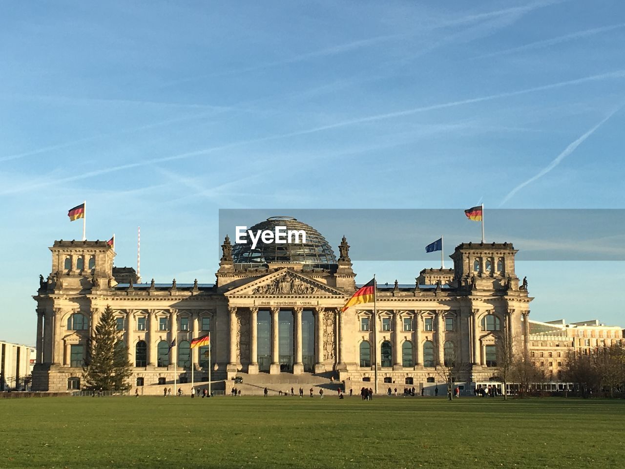 Facade of reichstag building against sky