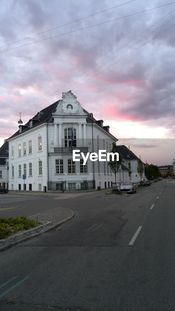 ROAD WITH BUILDINGS IN BACKGROUND