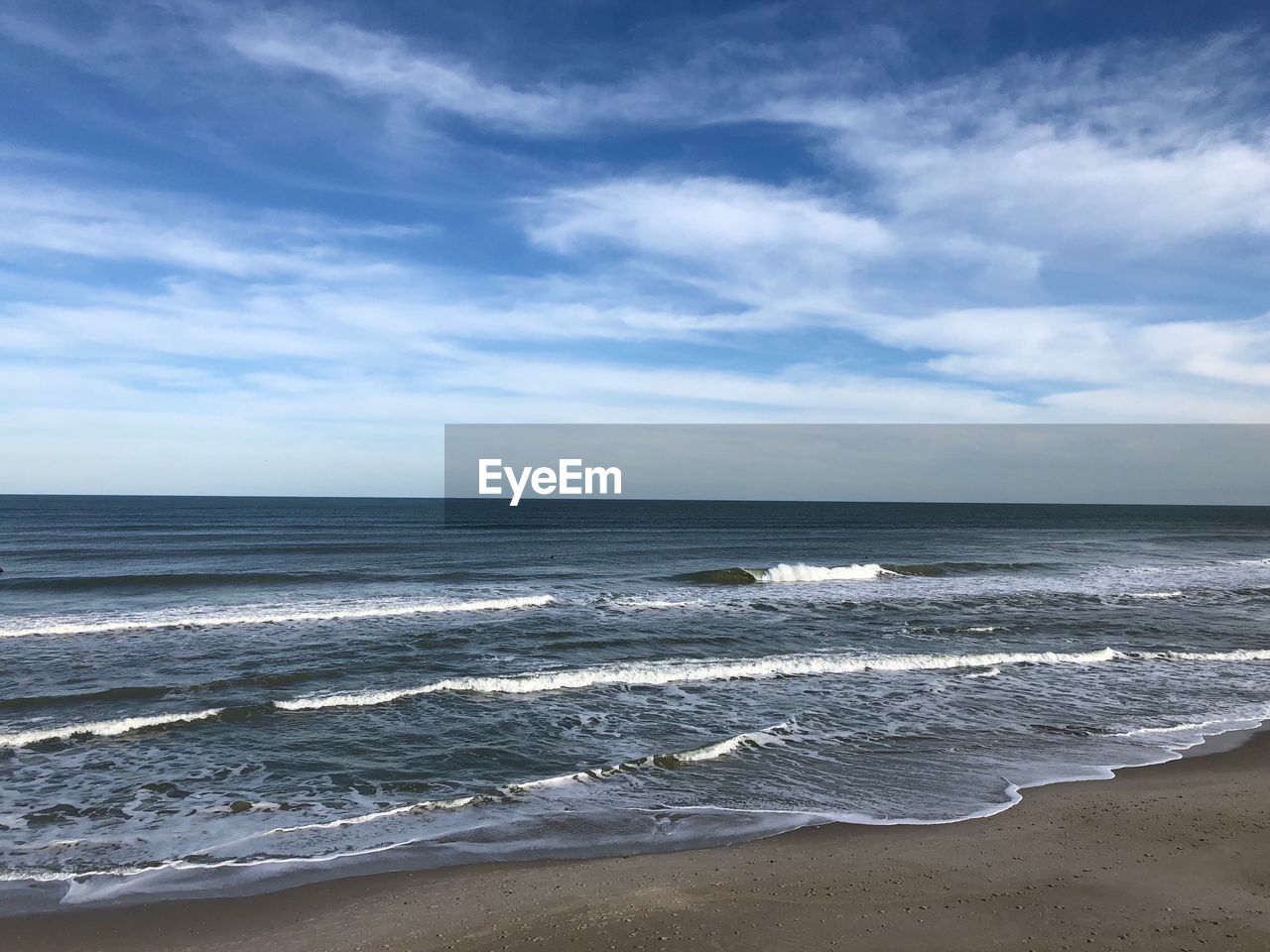 View of sea against cloudy sky