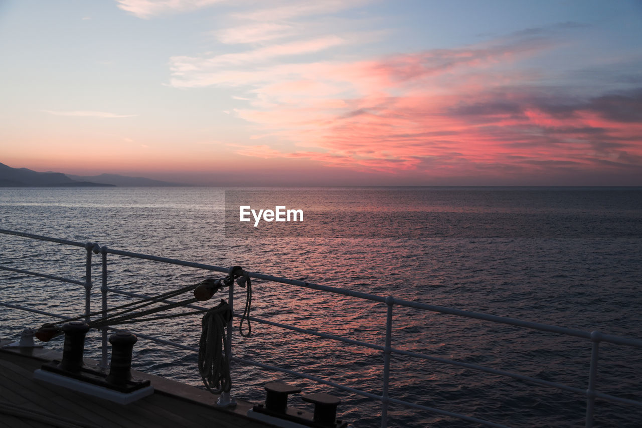 SCENIC VIEW OF SEA DURING SUNSET