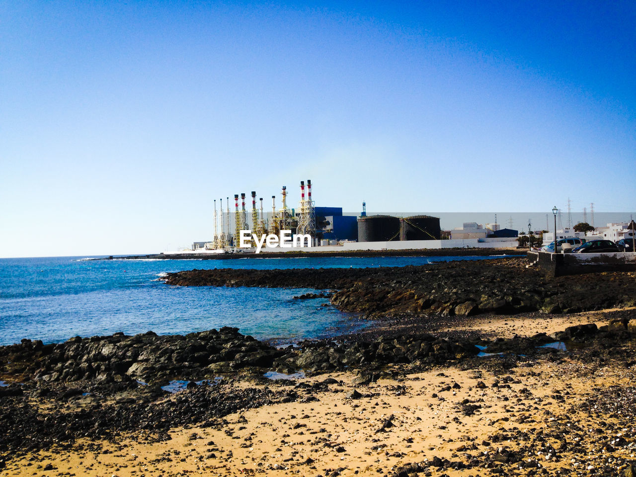 View of sea against clear blue sky