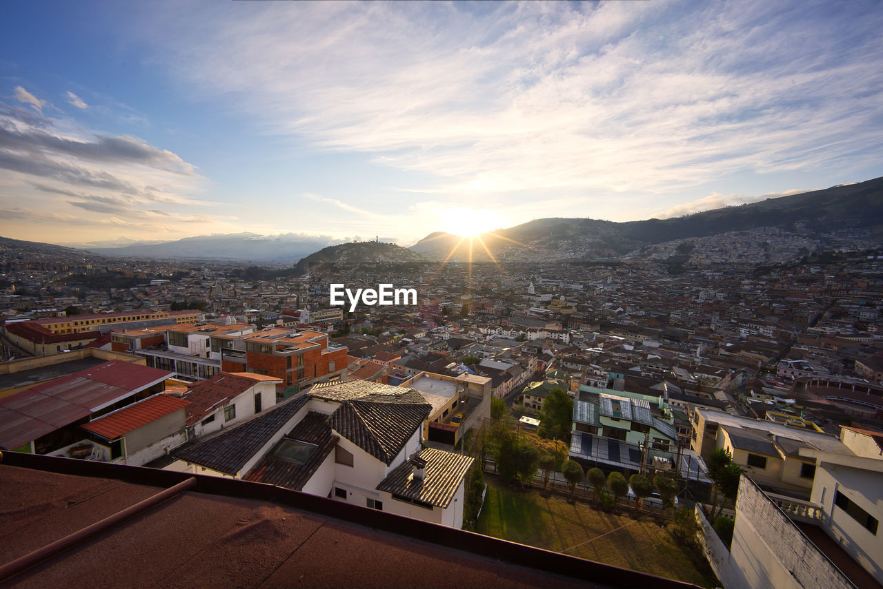 High angle view of townscape against sky during sunset