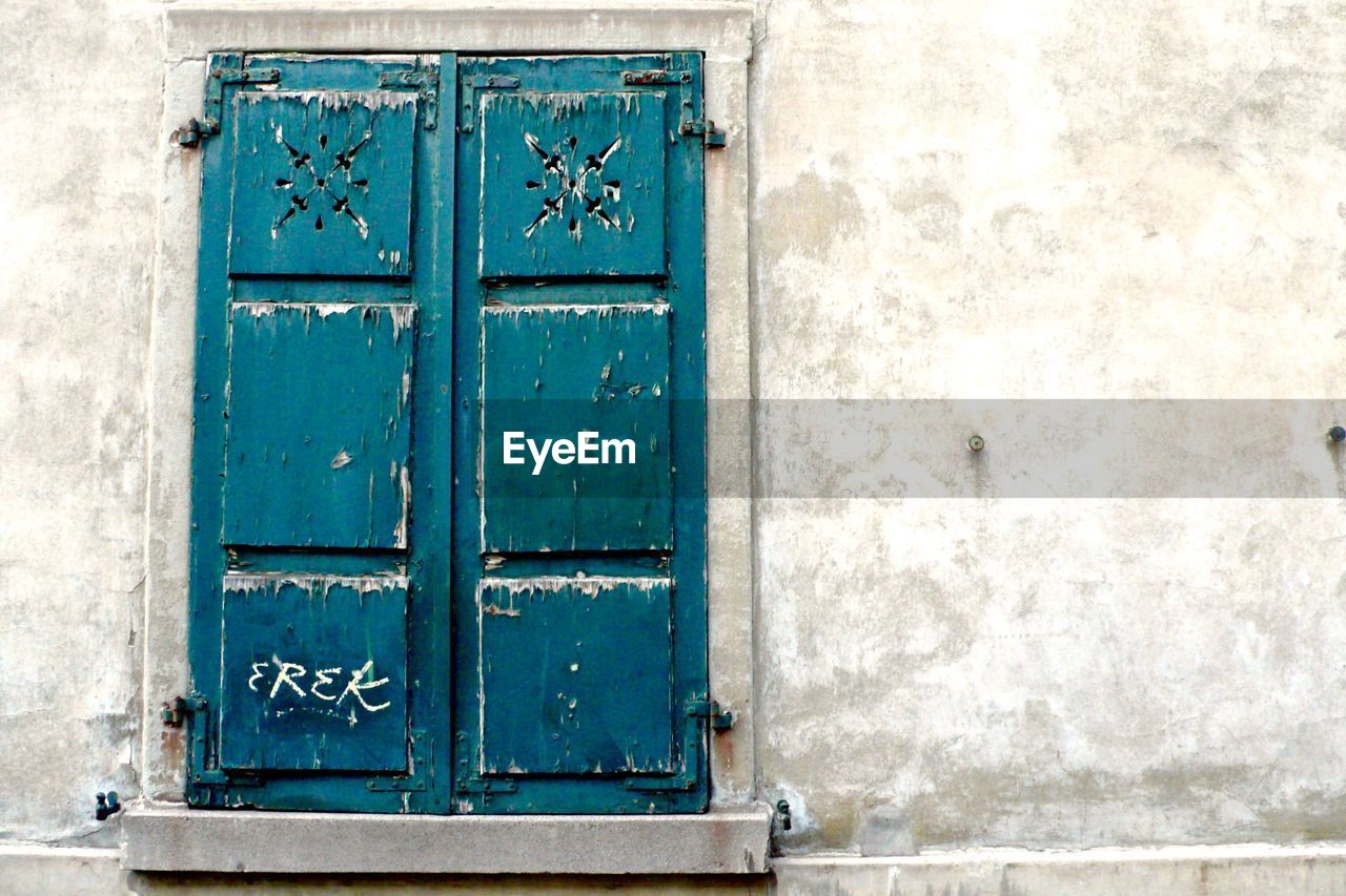 CLOSE-UP OF BLUE DOOR