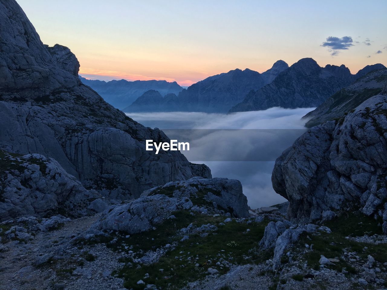 Scenic view of mountains against sky during sunset