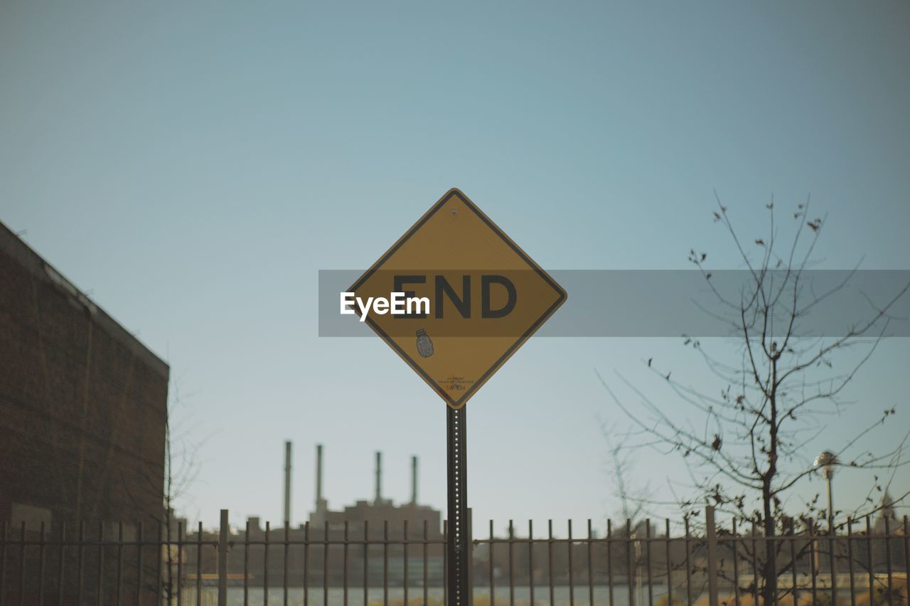 LOW ANGLE VIEW OF SIGN BOARD