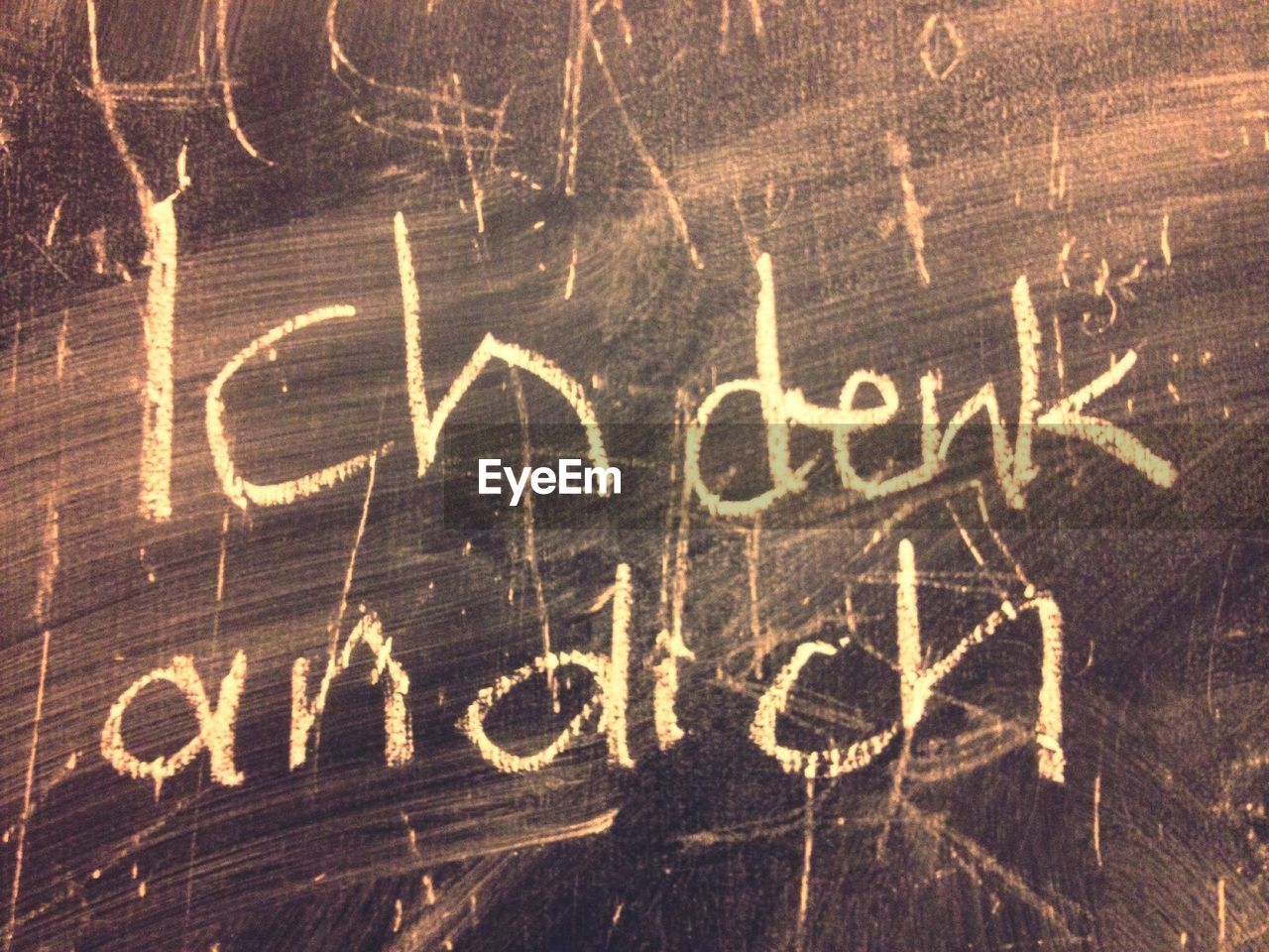 Chalk handwriting on blackboard