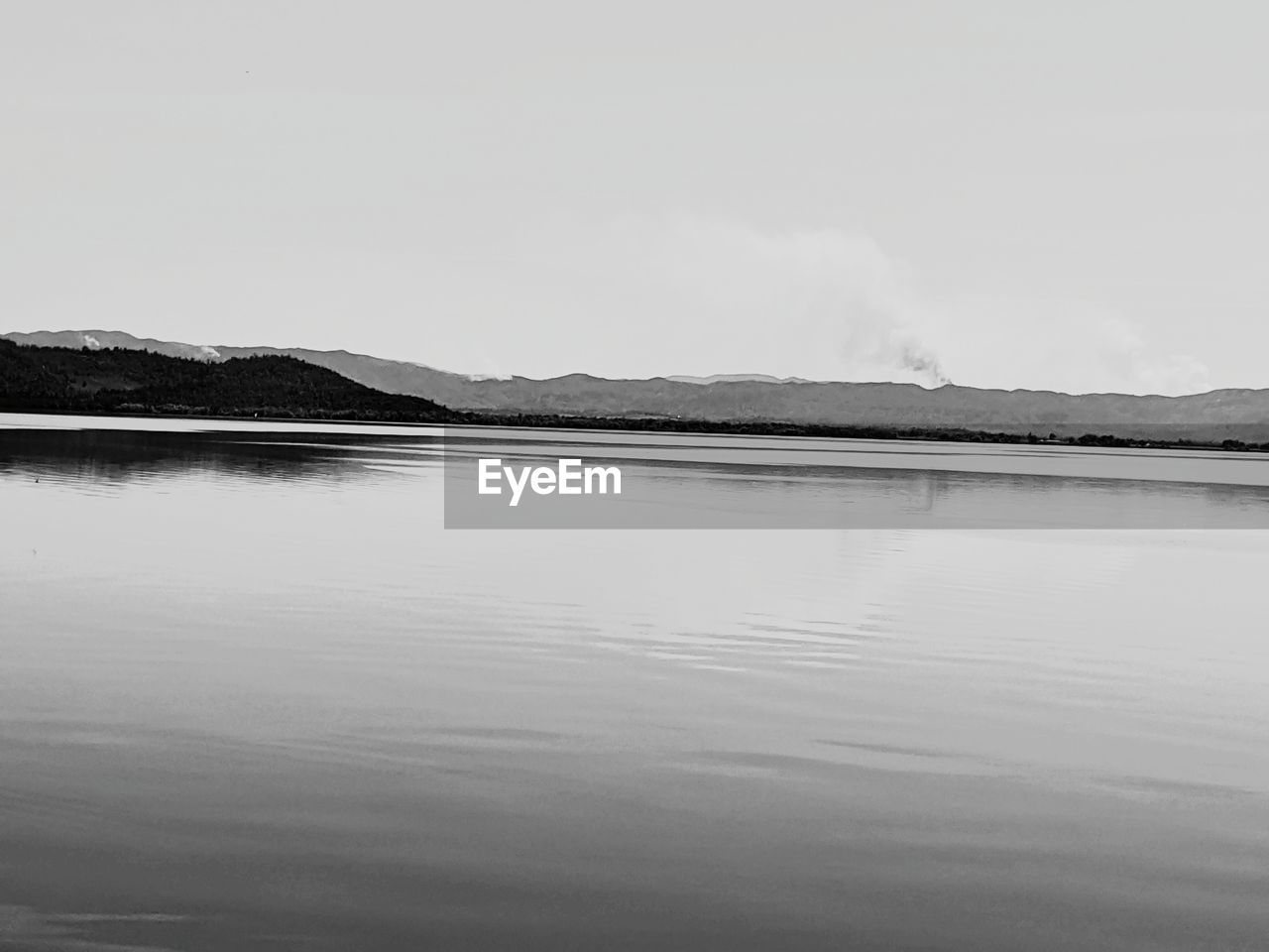 VIEW OF LAKE AGAINST SKY