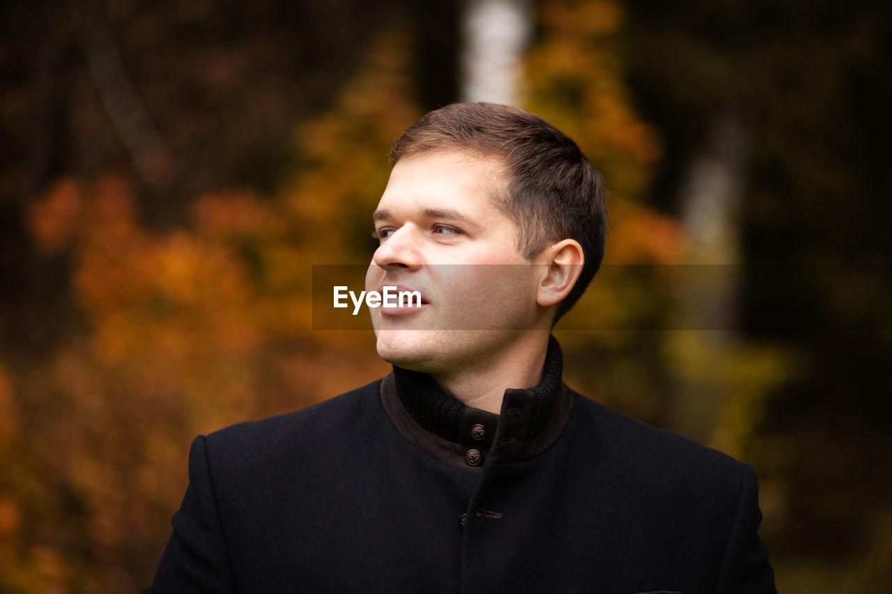 Young man looking away