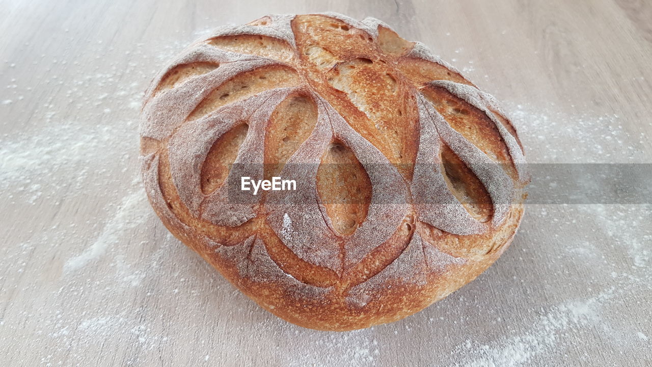 High angle view of home made bread on table