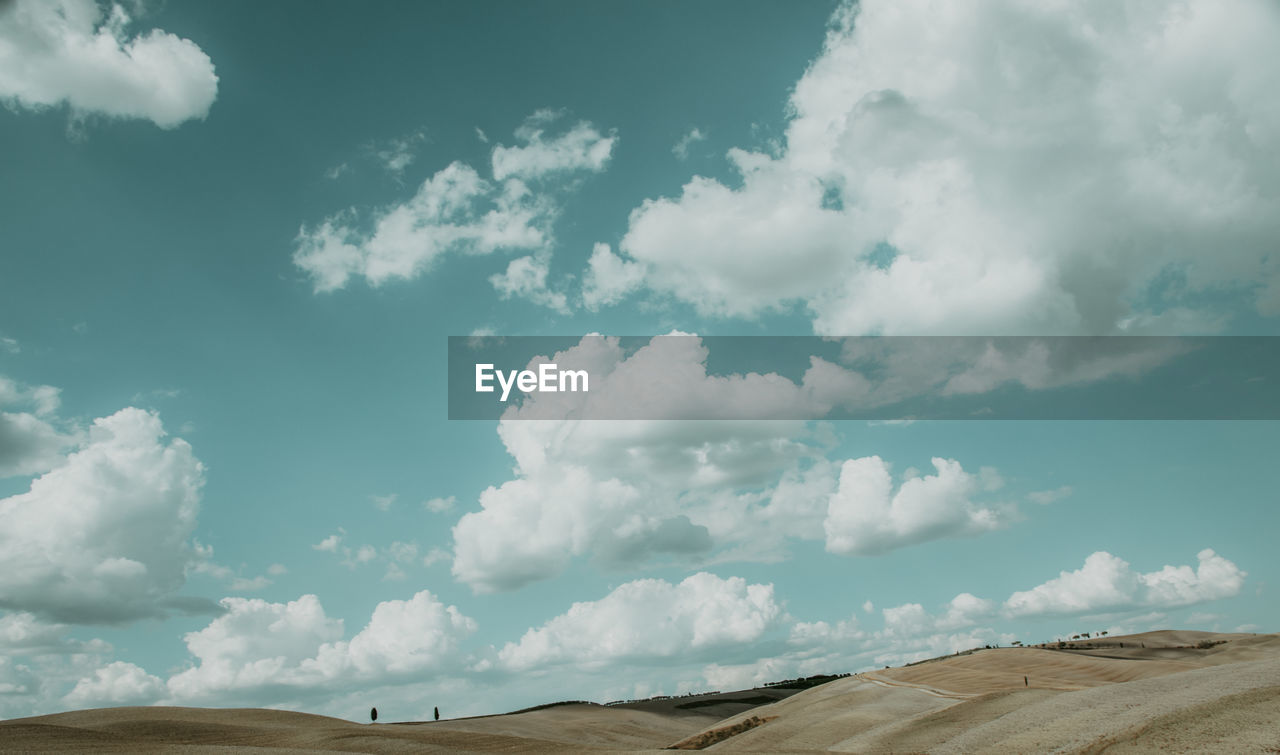 Low angle view of land against sky