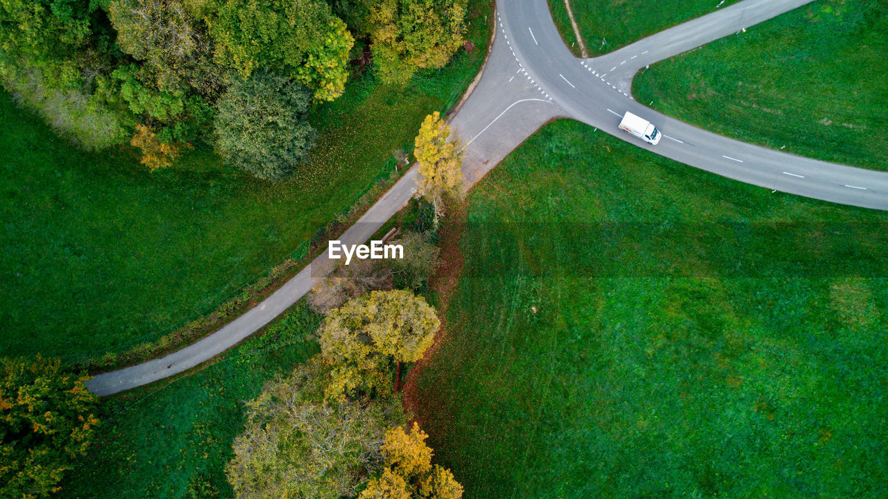 High angle view of road amidst trees