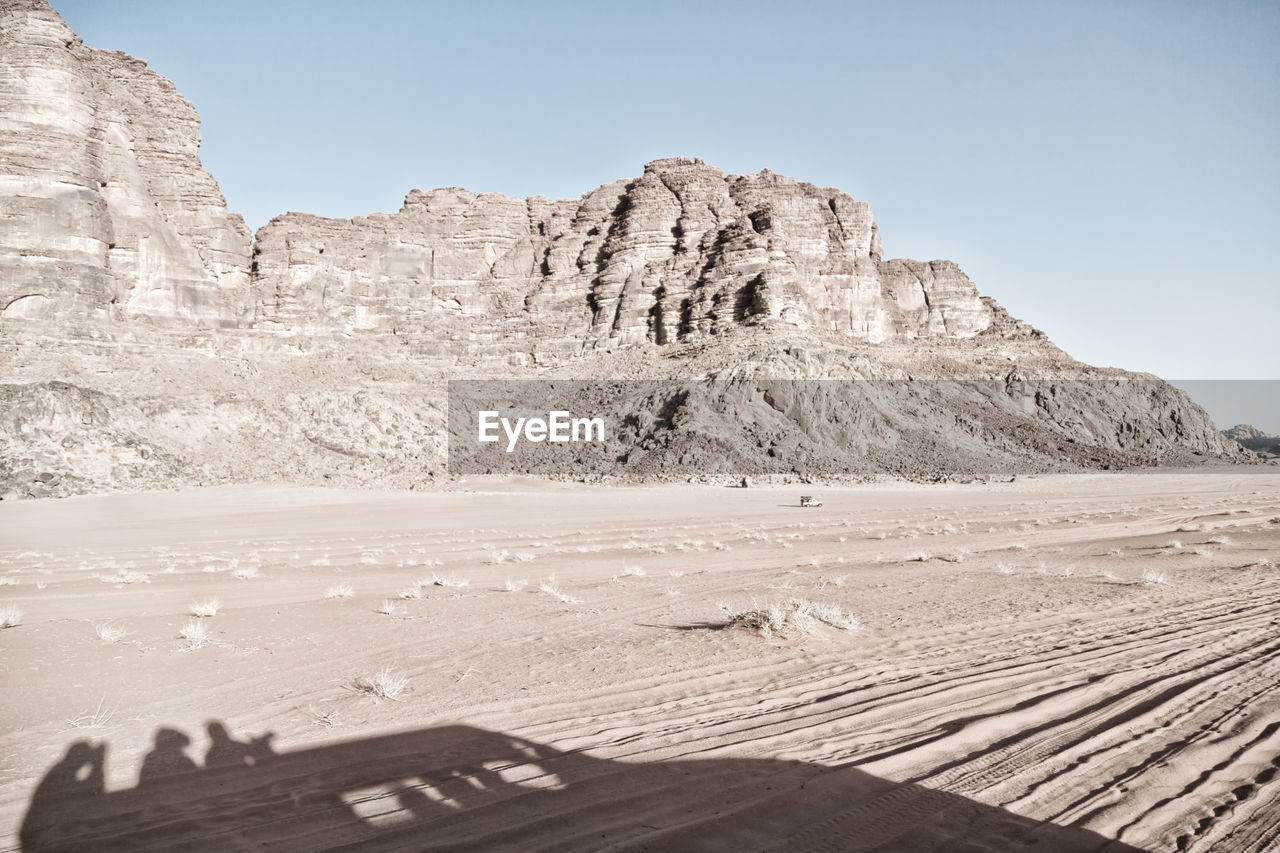 Scenic view of rocky mountains against clear sky