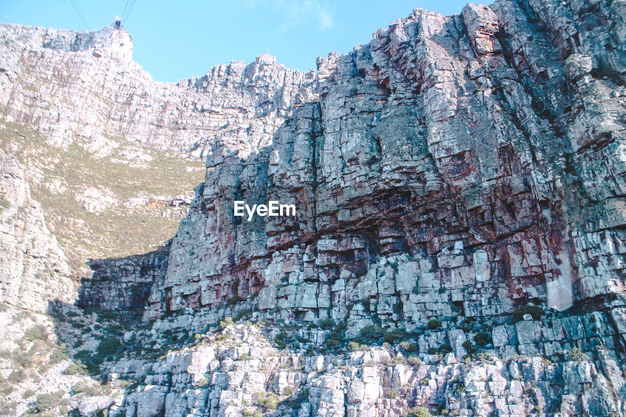 rock, rock - object, rock formation, mountain, solid, nature, geology, beauty in nature, day, no people, physical geography, non-urban scene, mountain range, outdoors, scenics - nature, rocky mountains, formation, sky, remote, travel destinations, rock face, eroded, mountain peak