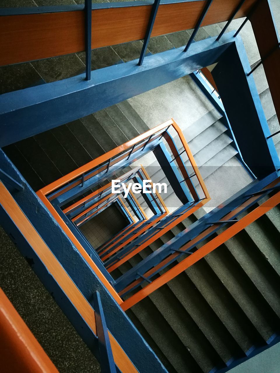 LOW ANGLE VIEW OF SPIRAL STAIRS