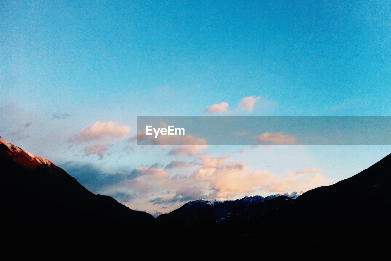 Panoramic shot of silhouette mountain against sky