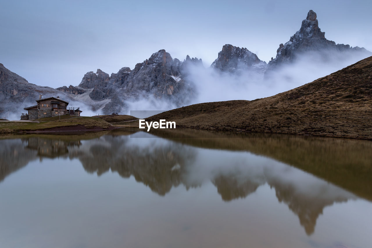 Panoramic view of lake and mountains against sky in dolomites mountains 