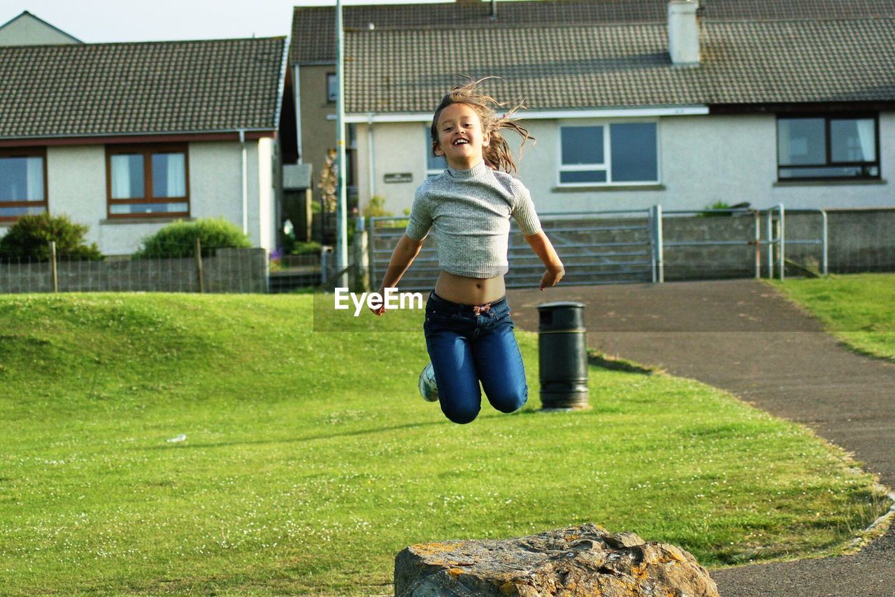 Young girl on lawn