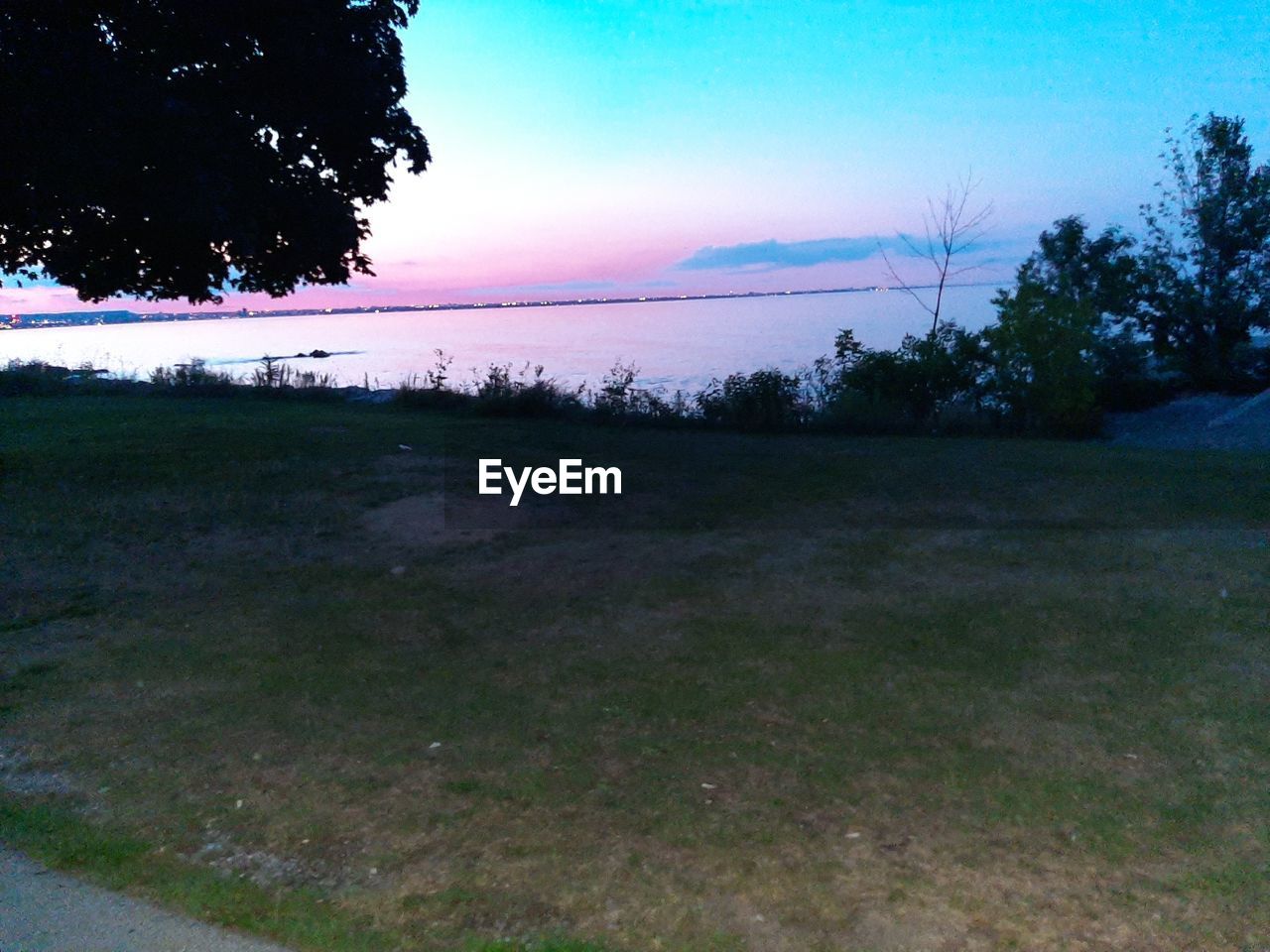 SCENIC VIEW OF SEA DURING SUNSET