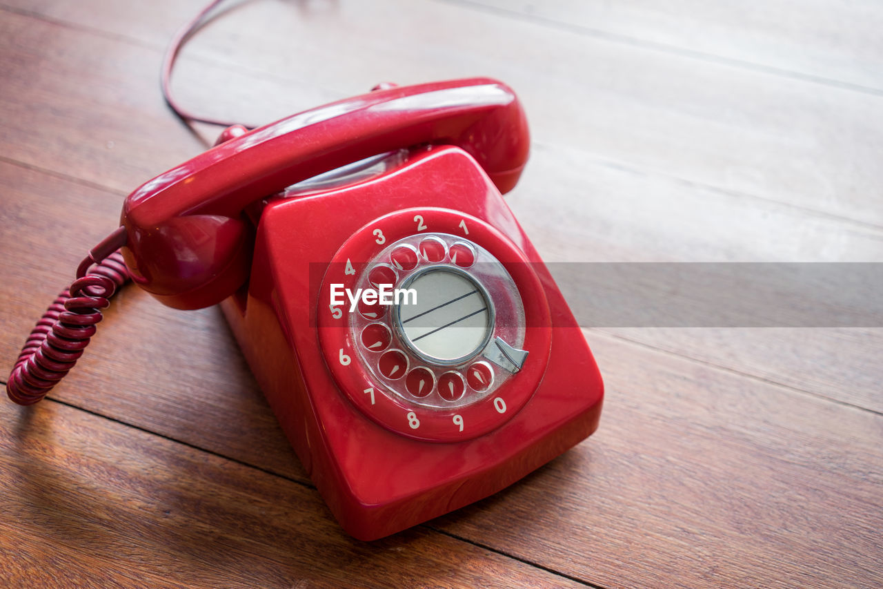 High angle view of telephone on table