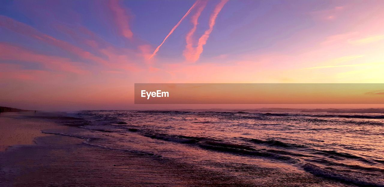 Scenic view of sea against sky during sunset