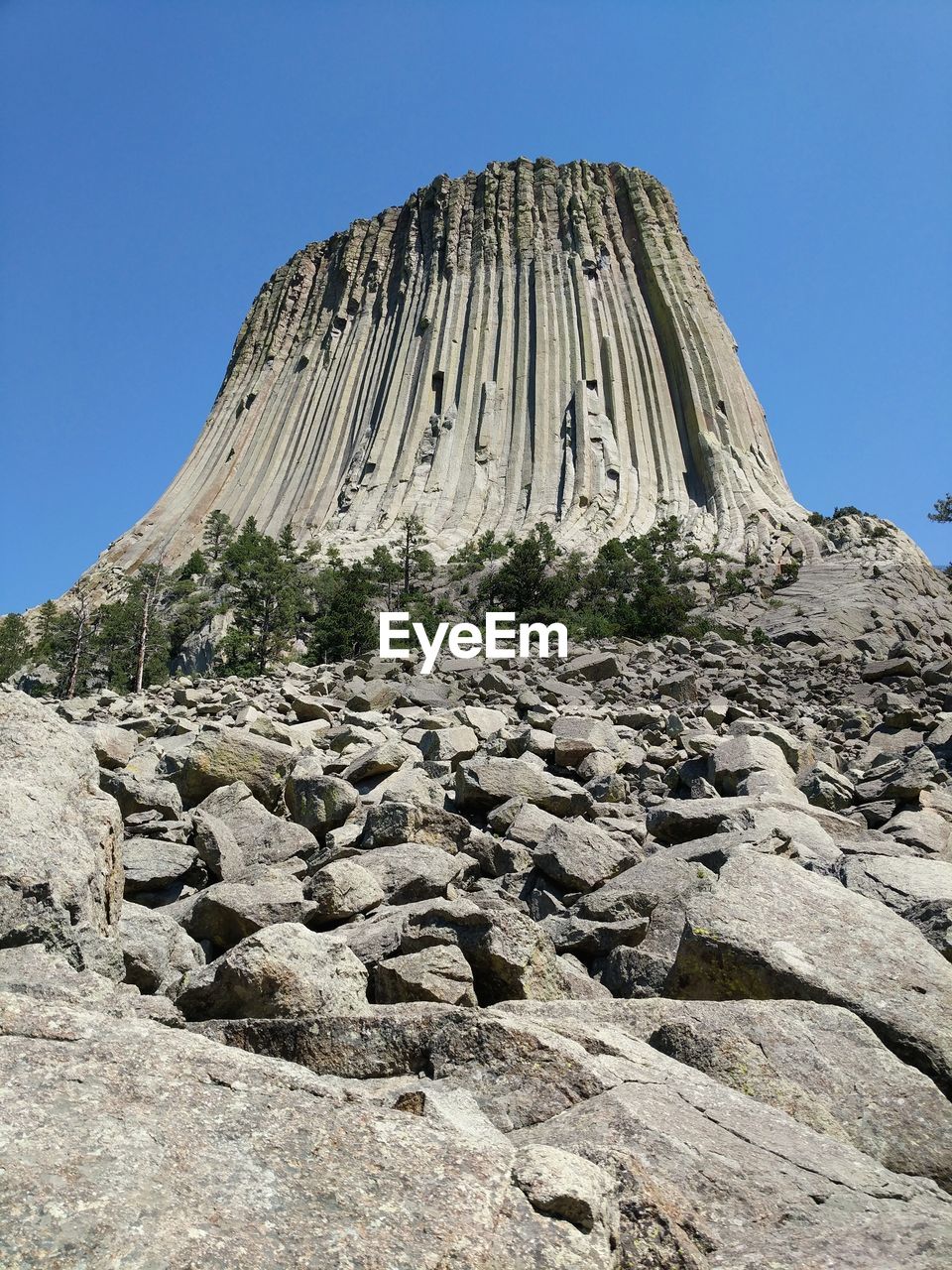 Low angle view of the devils tower.