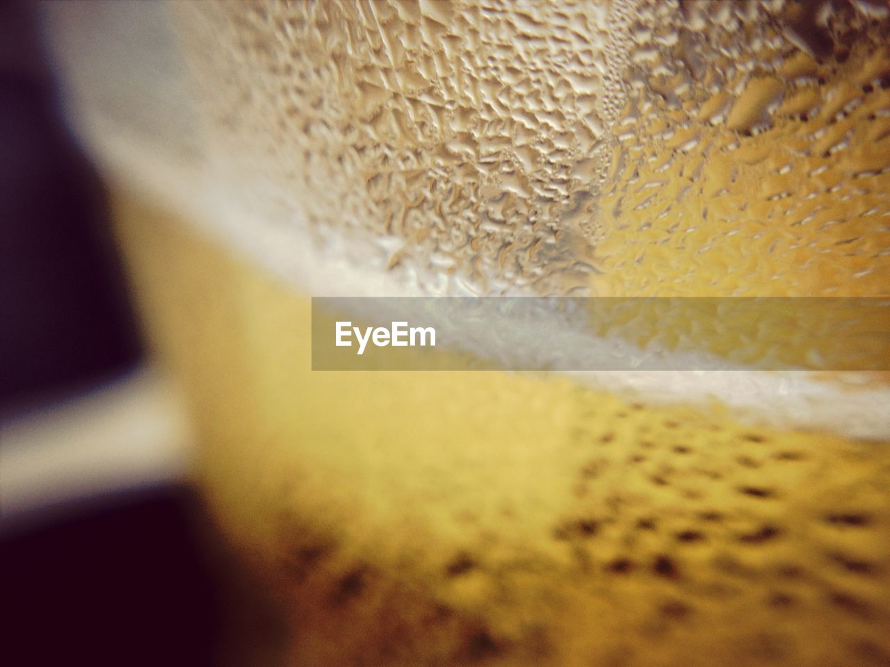 Close-up of beer glass