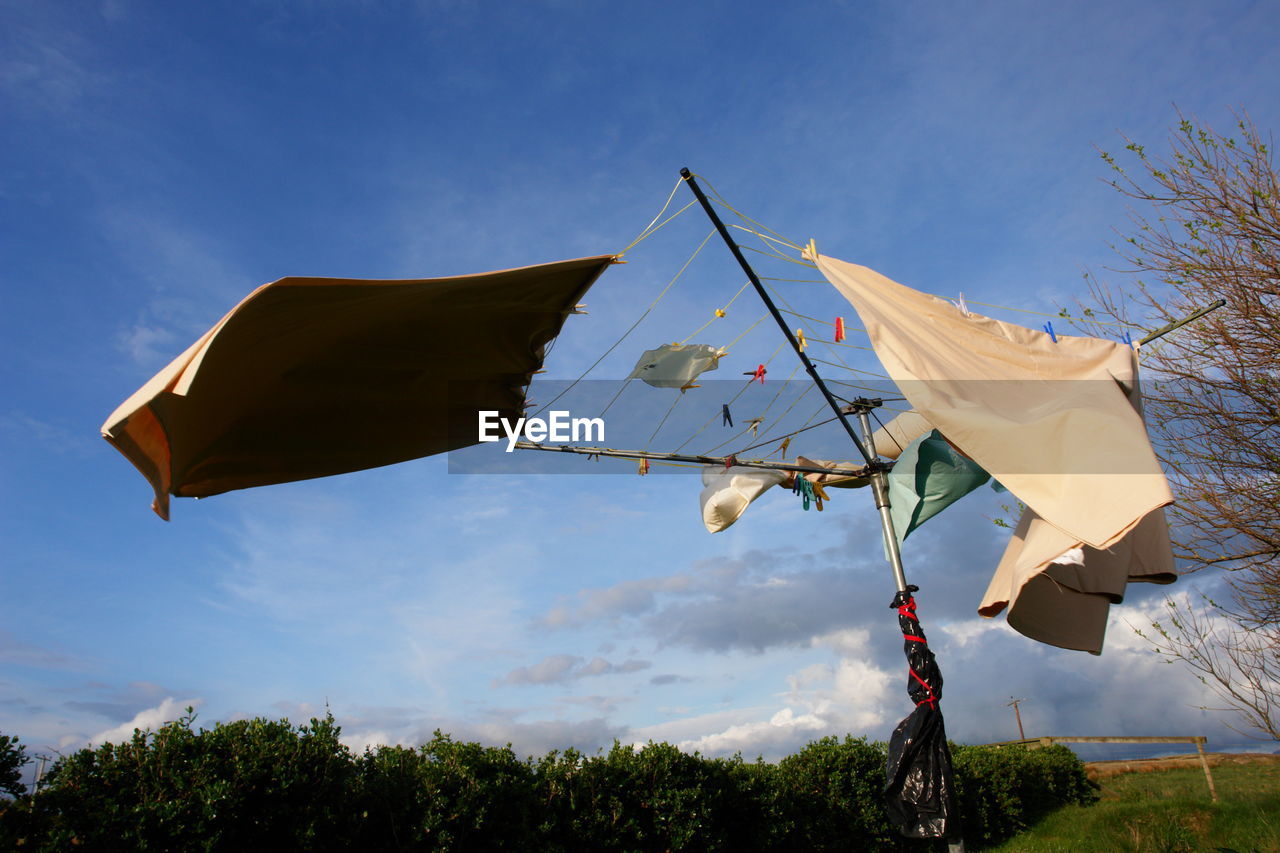 Low angle view of laundry drying outdoors