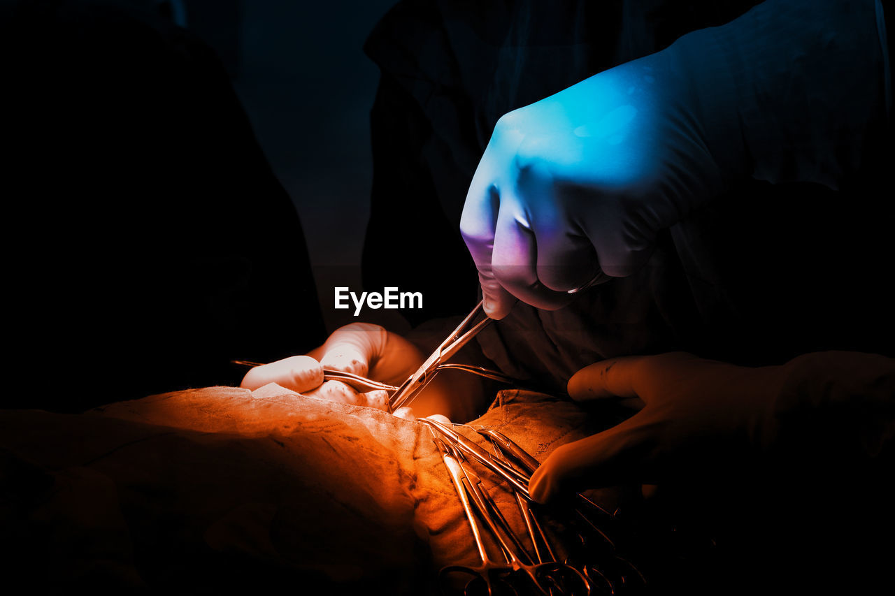 Pictures of surgery performed by a specialist surgeon. color tones distinguish blue and orange.