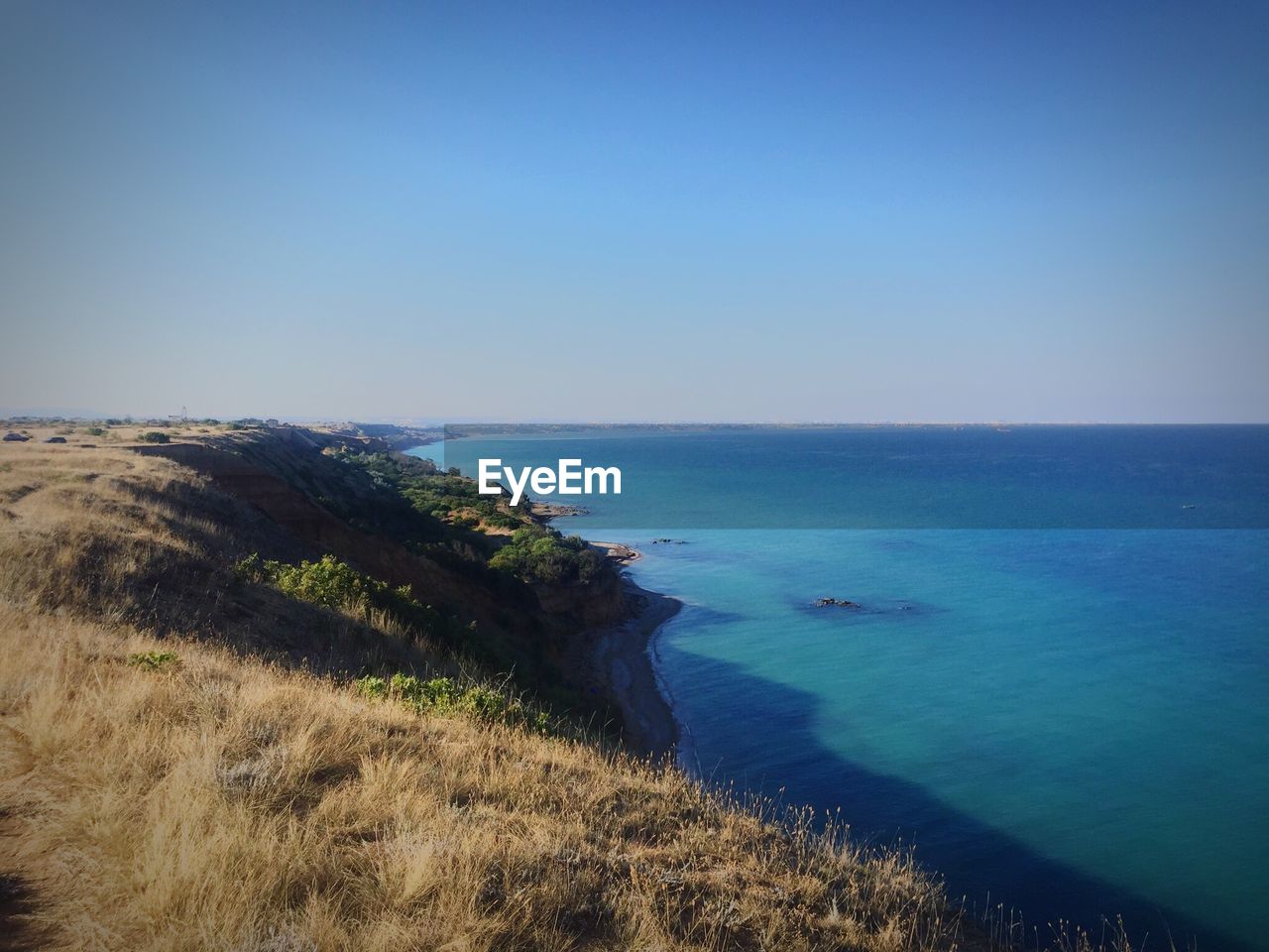 Scenic view of sea against clear sky