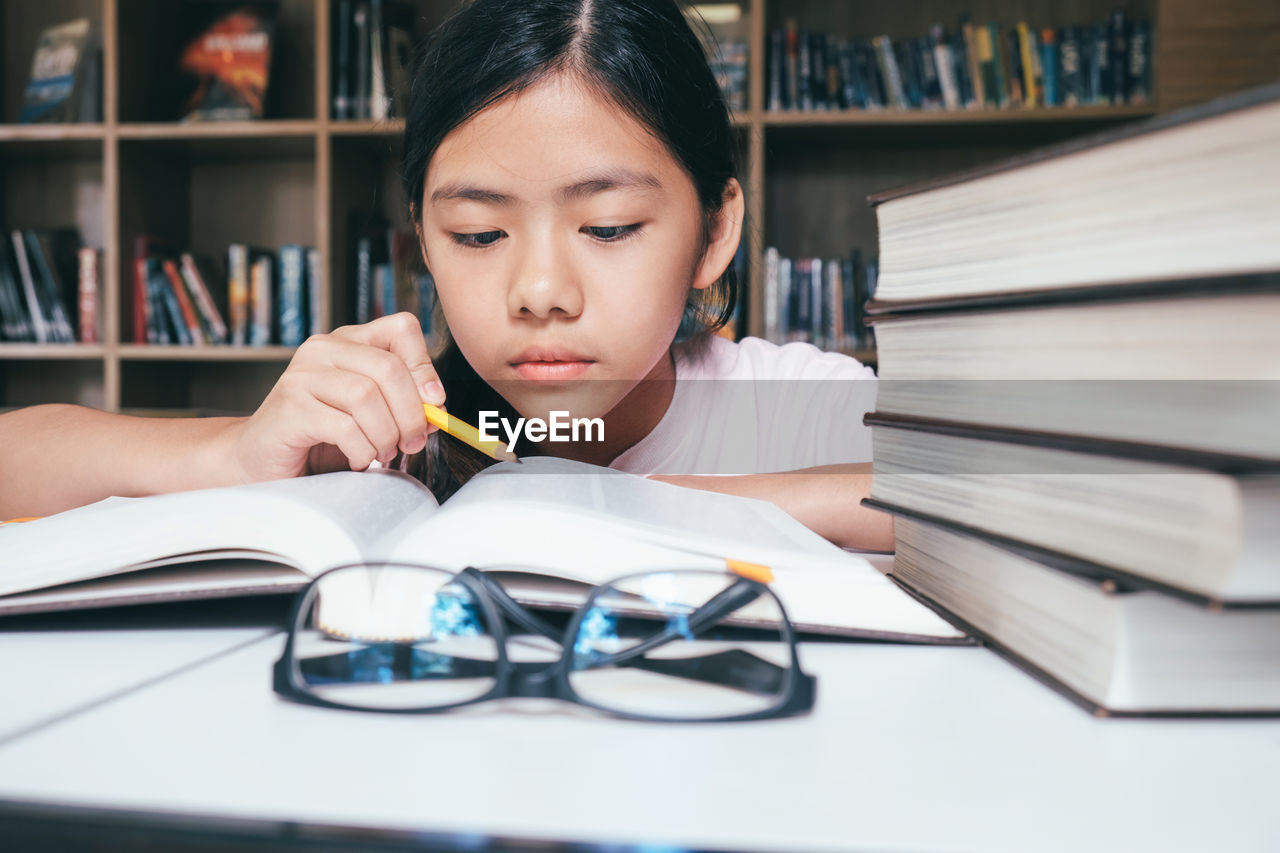 Girl studying at table