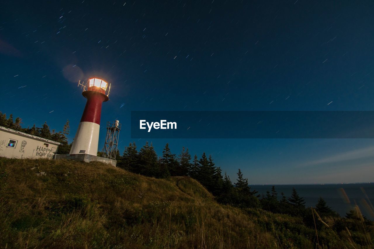 LOW ANGLE VIEW OF LIGHTHOUSE AGAINST SKY