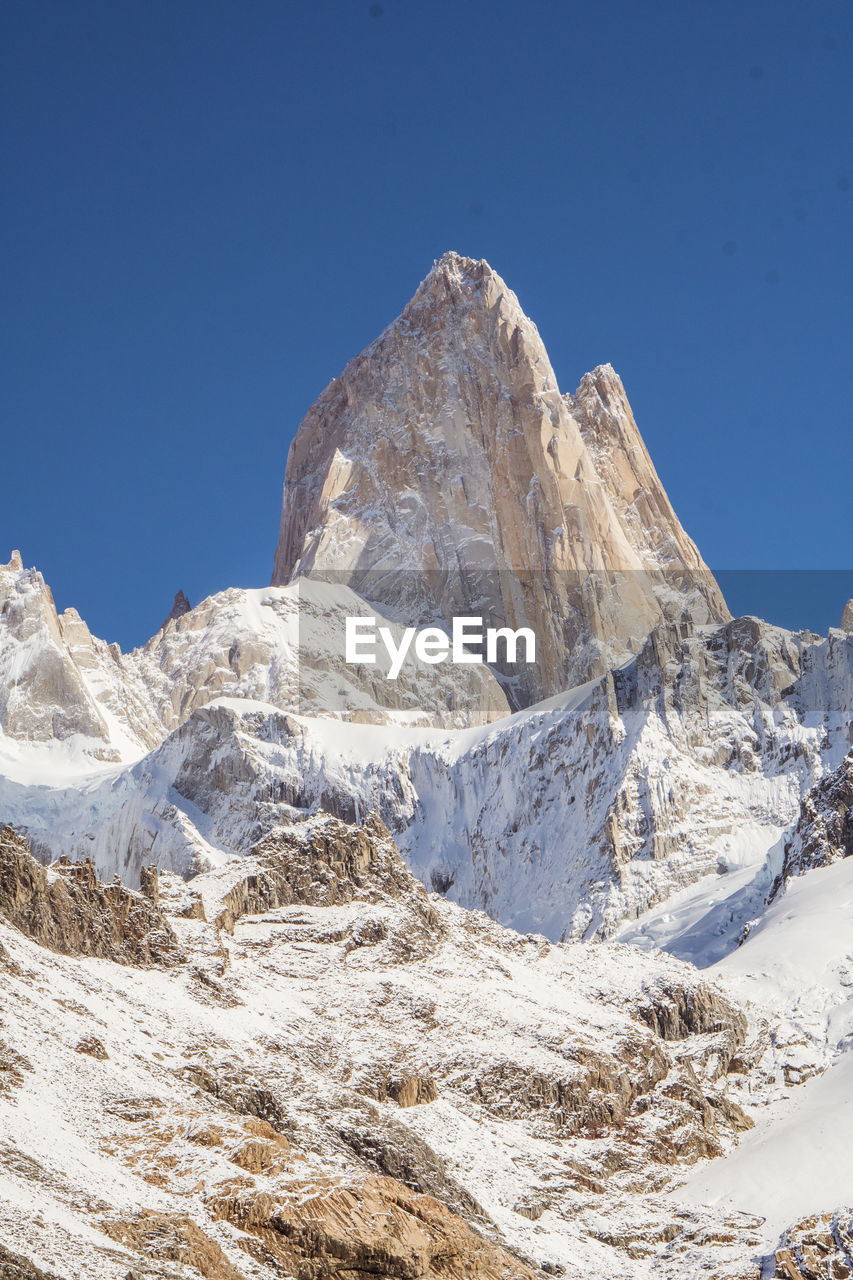 Scenic view of fitz roy against clear blue sky