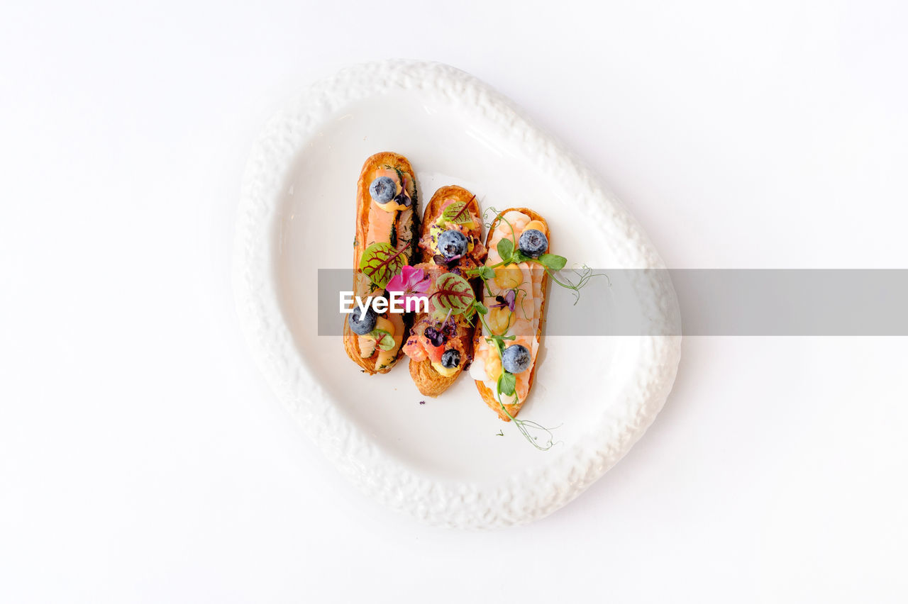 high angle view of heart shape decoration on white background