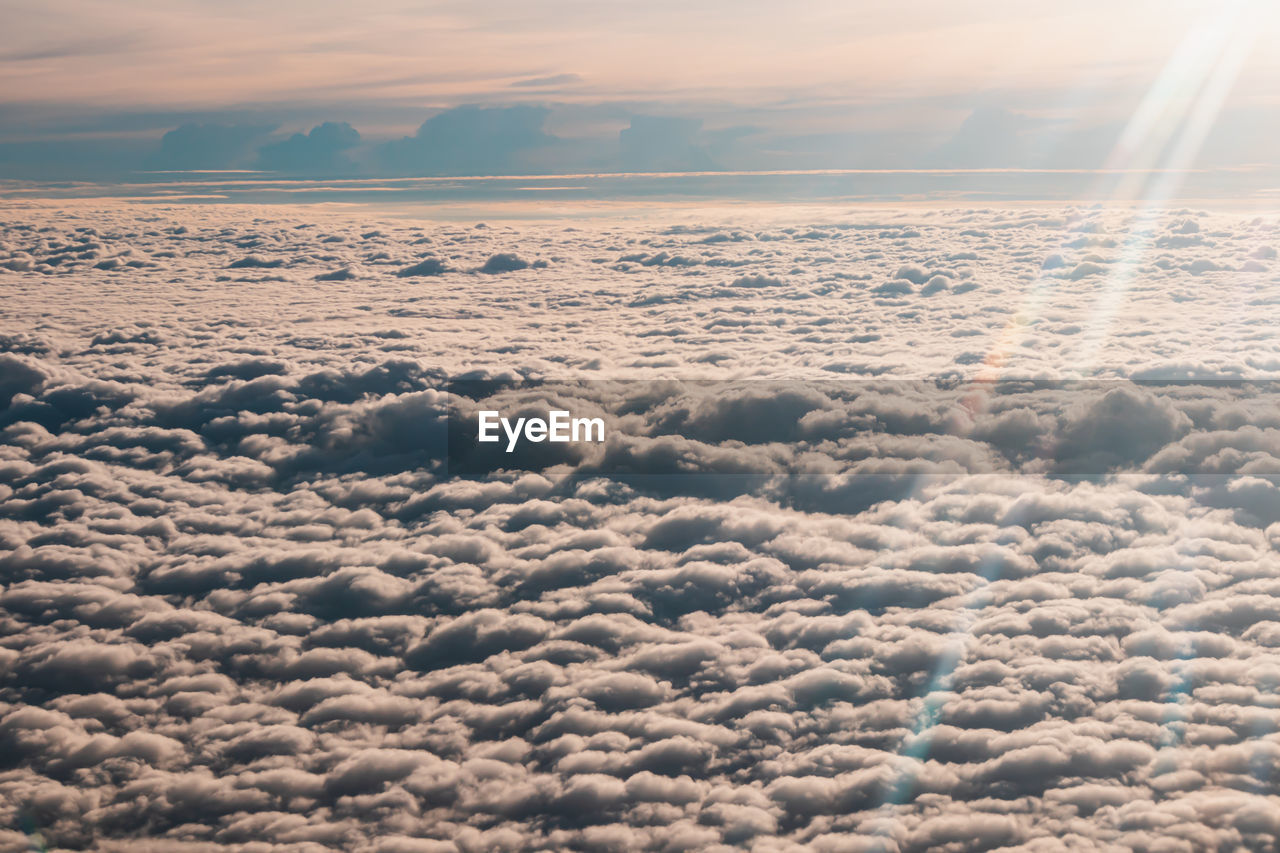 Aerial view of cloudscape against sky during sunset