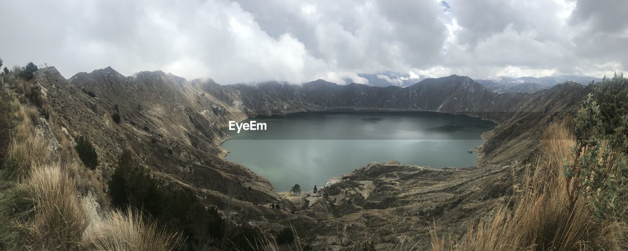 Panoramic view of lake and mountains against sky