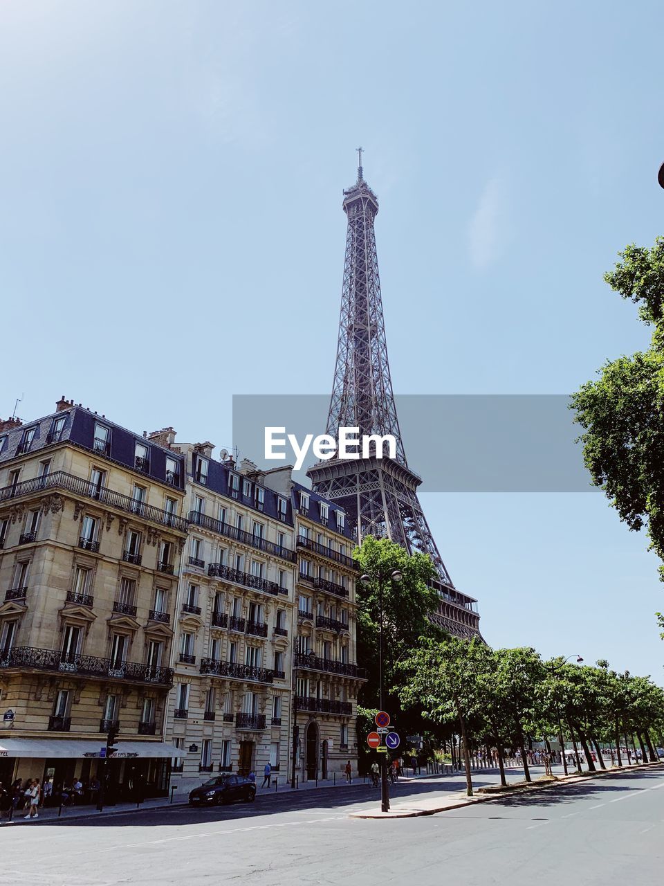 Low angle view of eiffel tower against clear sky in city
