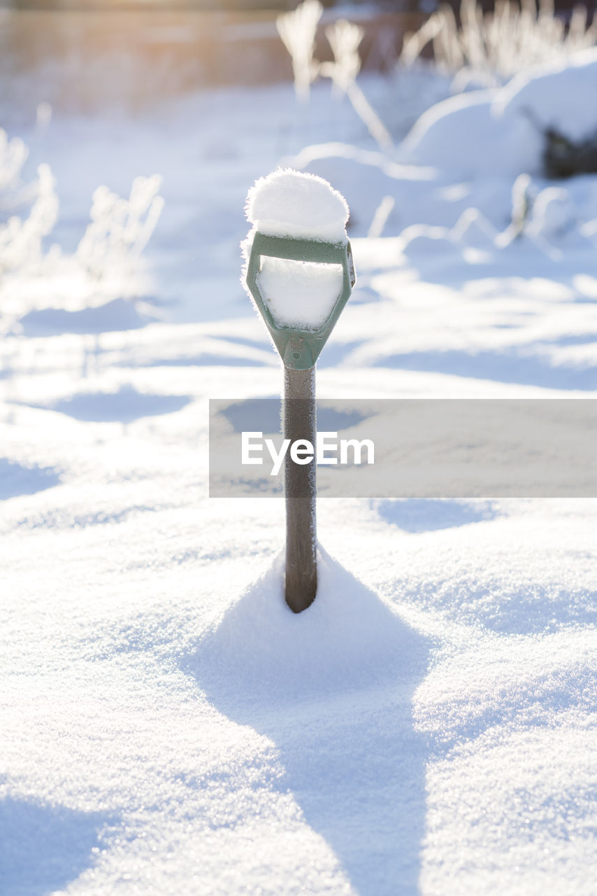 Spade in snow, sweden