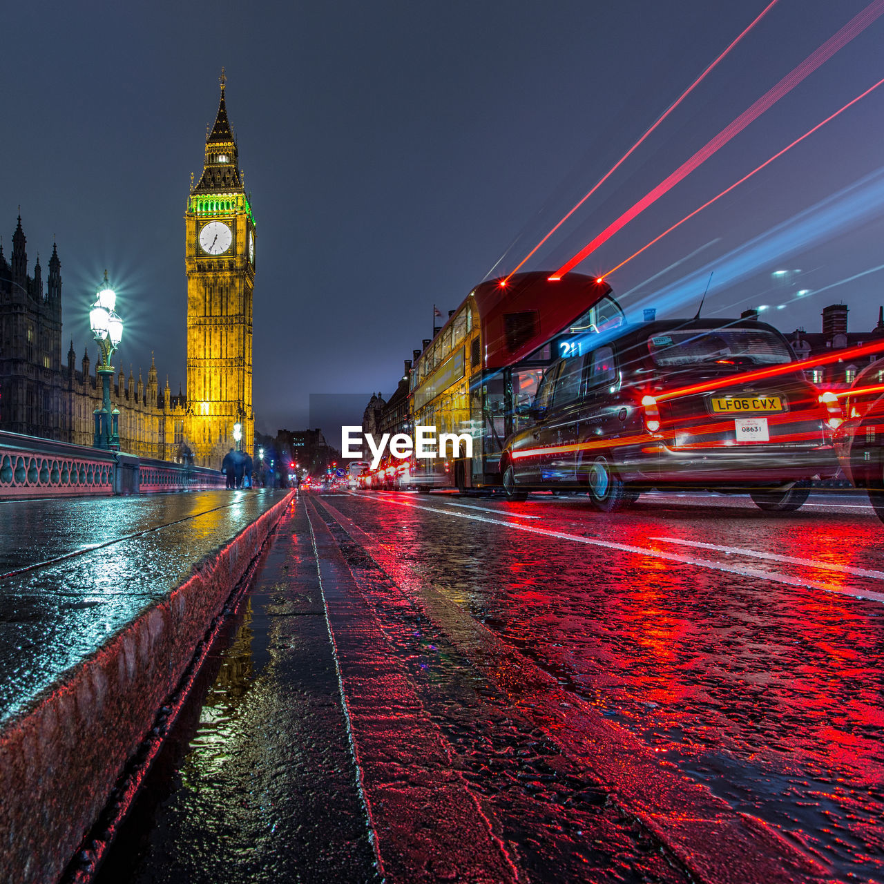 BLURRED MOTION OF ILLUMINATED CITY AT NIGHT