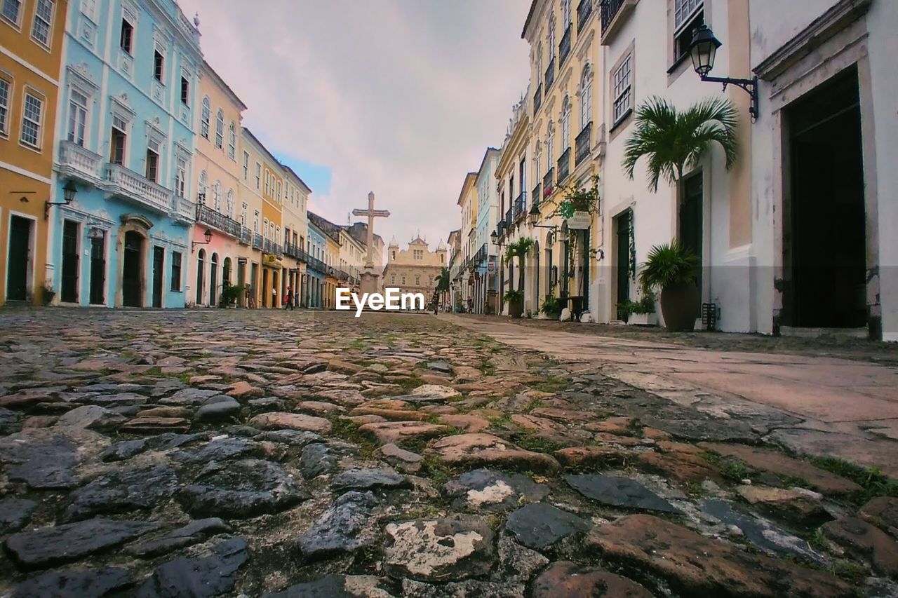 STREET AMIDST BUILDINGS IN CITY