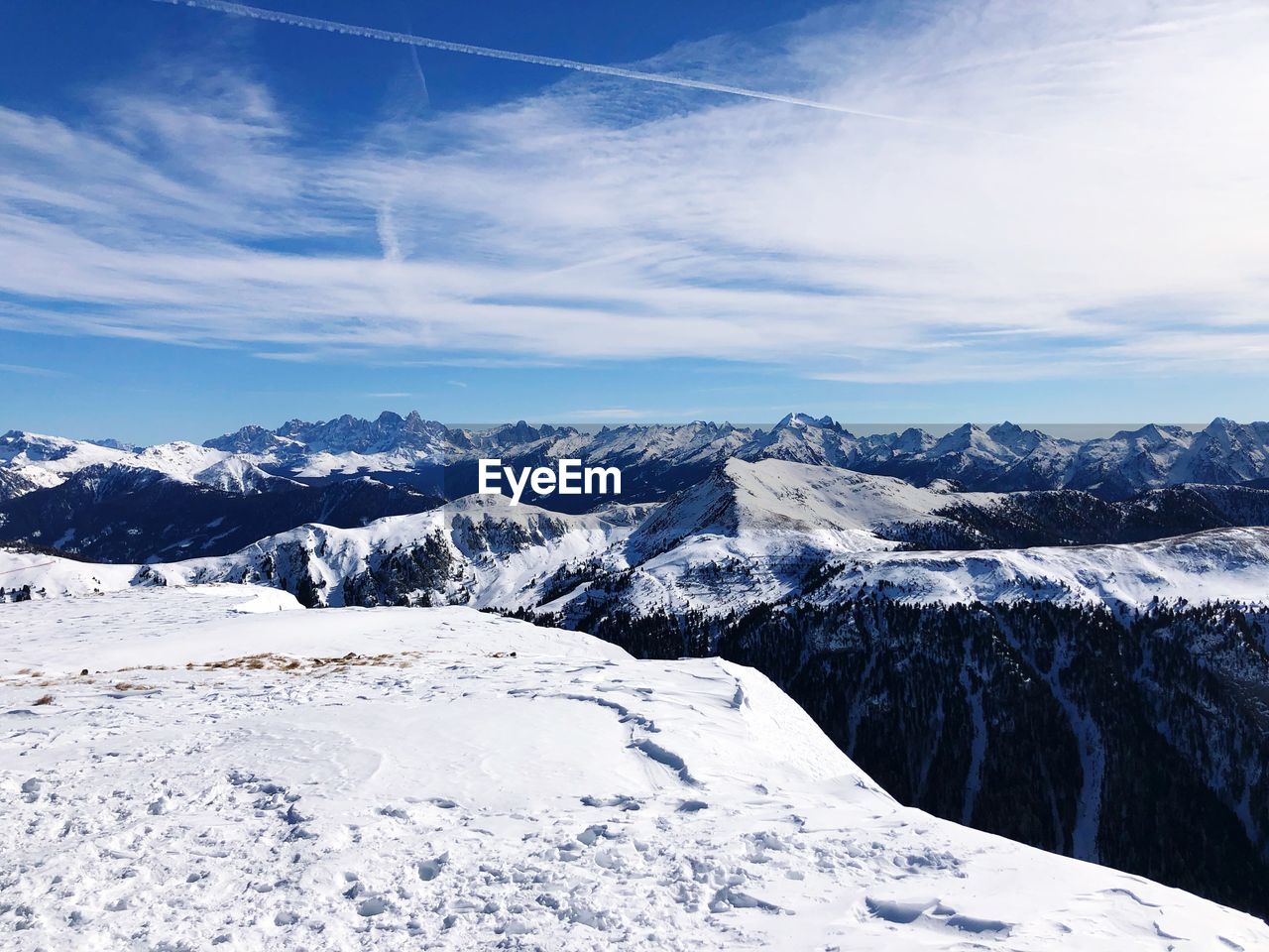 Scenic view of snowcapped mountains against sky