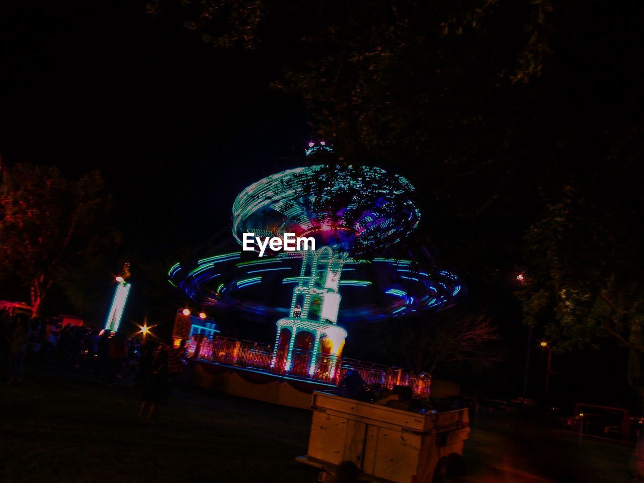 ILLUMINATED FERRIS WHEEL AT NIGHT DURING CHRISTMAS