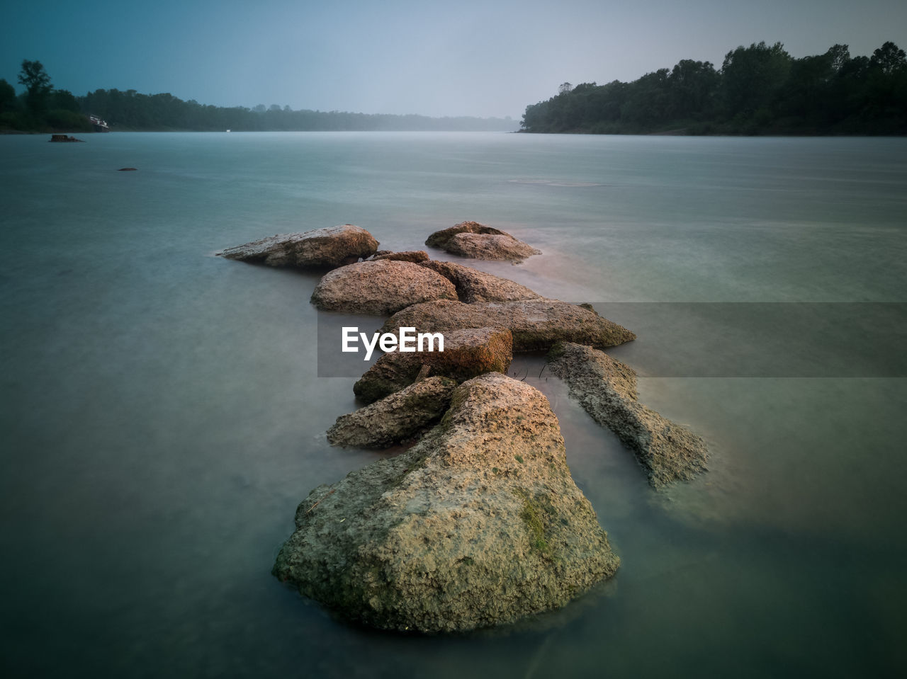 STONES ON ROCK IN SEA