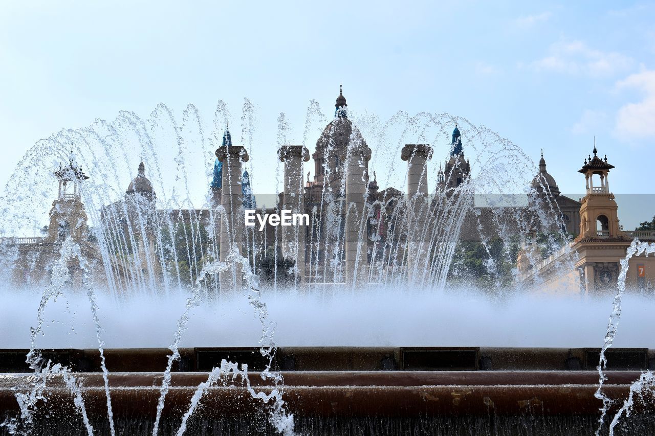 WATER FOUNTAIN AGAINST BUILDING