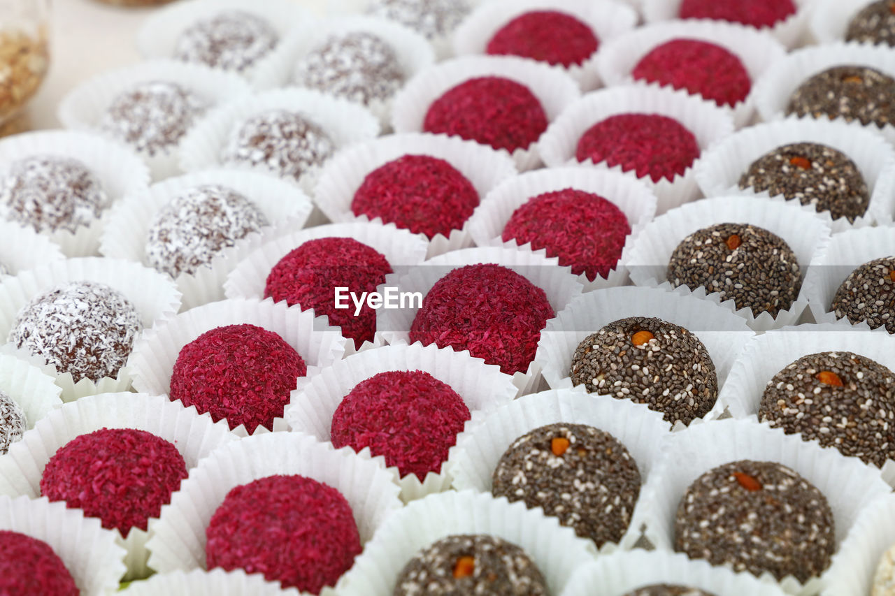 Full frame shot of various colorful chocolates in cupcake holder